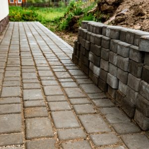 laying-paving-slabs-blind-area-house-min